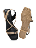 Zaysoo women's beige and black criss-cross strap flat sandals with a back strap and metallic detail.
