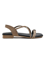 Zaysoo women's tan synthetic leather criss-cross strap flat sandals with back strap and metallic accent.